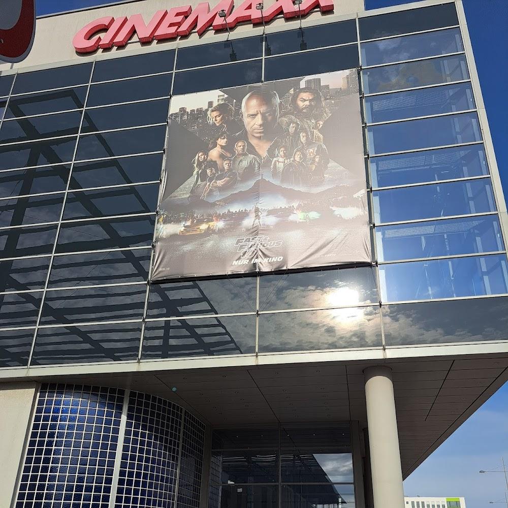 A movie theater with a poster for